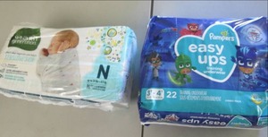 lot 194 image: Easy Ups & Newborn Diapers...