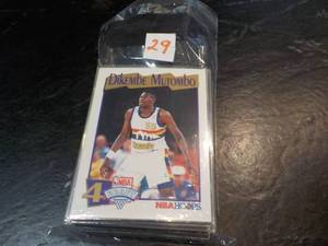 lot 29 image: 50 Dikembe Mutombo Cards...