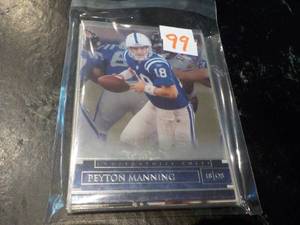 lot 99 image: Peyton Manning Cards...