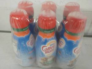 lot 198 image: 6 - 32 oz Bottles Pumpkin Spice Nes...