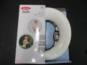 lot 12 image: OXO 2 in 1 Go Potty with Travel Bag...