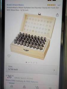 lot 43 image: Amazon Basics Metal Alphabet and Nu...