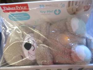 lot 76 image: Fisher Price Soothe N Snuggle Otter...