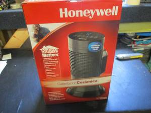 lot 191 image: Honeywell Ceramic Heater...
