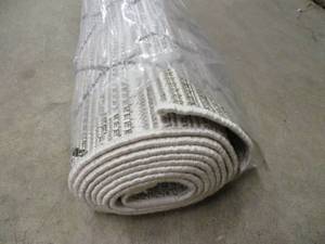 lot 332 image: 9 x 12 Patio Rug- new in packaging...