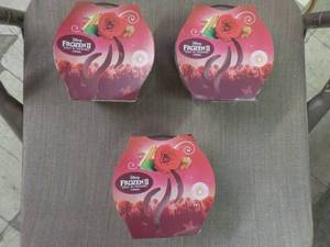 lot 209 image: Frozen 2 Rose Candle x 3...