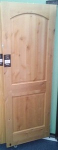lot 149 image: Bayer 30 in. 2 Panel Eyelash Arch Prefinished Interior Standard Door