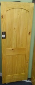lot 150 image: Bayer 30 in. 2 Panel Eyelash Arch Prefinished Interior Standard Door