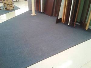 lot 173 image: Carpet Squares  18 ft. x 18ft.  and 24 x 18 Triangle area.