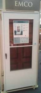 lot 189 image: New Emco Exterior Storm Door, with Frame
