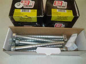 lot 227 image: Grip Rite 6in. Polebarn Nails and Simpson Anchor Screws.