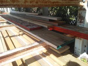 lot 742 image: Laminated Beams. 2x12x18 (3) and 2x10.
