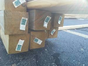 lot 753 image: Green treated and more. $225 for the 4 x4 s  Outside
