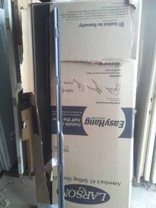 lot 770 image: Larson Brown Screen-away Storm Door. NEW in Box over $200 retail