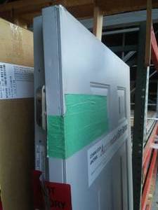 lot 773 image: Bayer Metal Exterior Door. W knob and hinges