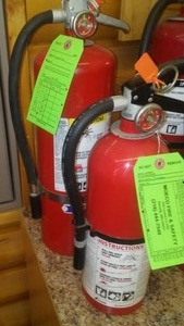 lot 801 image: Badger 10 lb. And Kidde 5 lb. Fire Extinguishers.