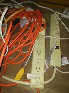 lot 4 image: LATE ADDITION  Extension cords and power strips.