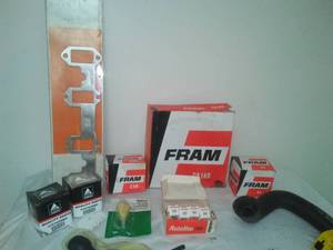 lot 332 image: New air filter, oil filters, spark plugs, head gaskets & more.