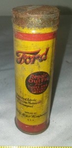 lot 383 image: Ford Antique Tire patch kit