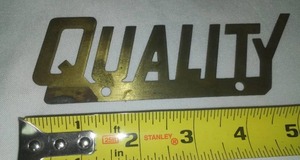 lot 400 image: Brass Quality Sign. Trunk