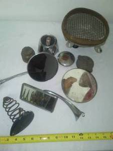 lot 401 image: Misc. vintage auto mirrors, gas caps & more.