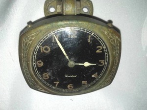 lot 438 image: Vintage Auto Clocks, Stromberg Condenser, Airline Montgomery Ward & more.