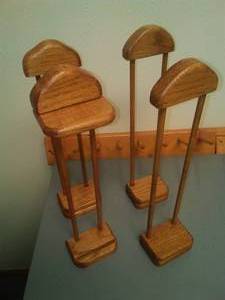 Hanging oak Plate Holders & wood Logic pegs for storage.