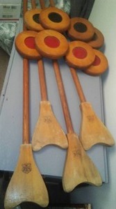Antique Shuffleboard Pucks & Sticks. Full set
