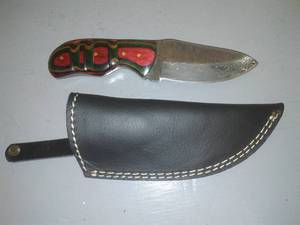 Knife & leather sheath.