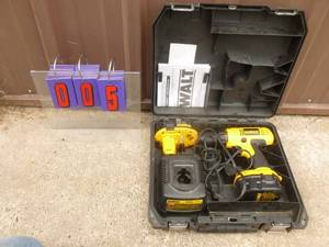14.4 volt Dewalt drill with 2 batteries & charger. Tested & works. As shown.