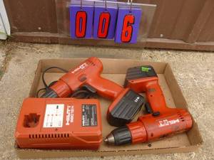 Hilti drill with 2 batteries & 1 charger. Tested & works. As shown.