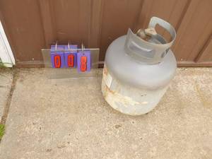20lb propane tank with new style valve. Used condition. As shown.