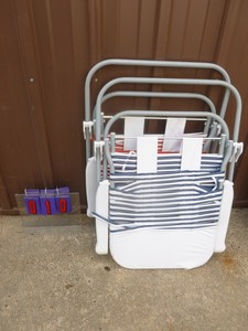 Qty of 2 folding lawn chairs. As shown.