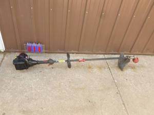 Craftsman 2 cycle weed trimmer. Lightly used. Tested & works. As shown.