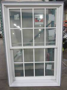 lot 609 image: Andersen Double Hung, Tilt Wash, Vinyl-Clad Wood Frame, Dual Pane, Low EArgon Filled Glass. In White, AND-N-24-04404-00001 - Never installed
