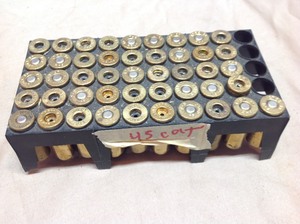 lot 58 image: 46 45 Colt Casings