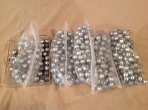 lot 168 image: 10# 50 Cal Lead Balls