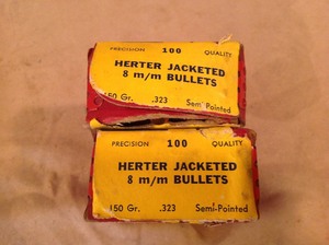 lot 213 image: Full Boxes Vintage Bullets