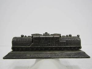 lot 90 image: Antique Chicago, Milwaukee & Saint Paul Railway Advertising Paperweight - To Puget Sound