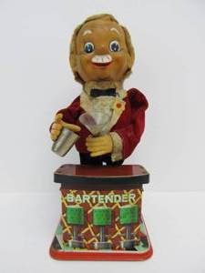 lot 200 image: Vintage Charlie Weaver Tin Toy Bartender