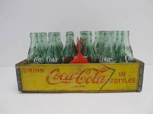 lot 63 image: Vintage Yellow Coca Cola Soda Crate wBottles