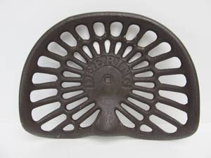 lot 224 image: Antique McCormick Deering Cast Iron Tractor Seat