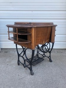 lot 332 image: Antique NEW ROYAL Sewing Machine Cabinet wCast Iron Base