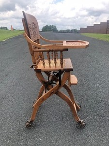lot 373 image: Antique Oak Adjustable Highchair wCast Iron Wheels