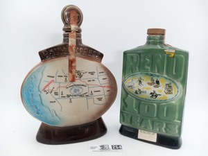lot 254 image: 1968 Pony Express & Reno Ceramic Jim Beam Decanters