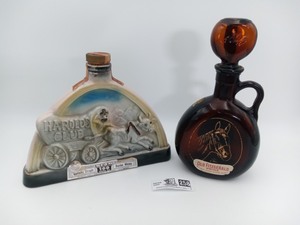 lot 258 image: 1969 Jim Beam Decanter Harolds Club or Bust Jim Beam & Fitzgerald Horse Decanters
