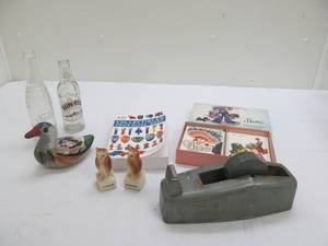 lot 134 image: collectibles price book, bottles, notes
