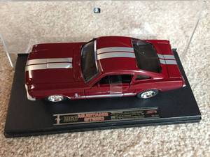 lot 220 image: Hot Rod Clock, Robert Ford Hot wheels, And Model 1966 Mustang GT350 In Display Case