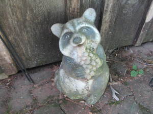 lot 73 image: Cement Raccoon