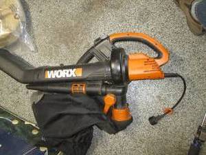 lot 476 image: Worx Leaf Blower Bag Taped See Ph...